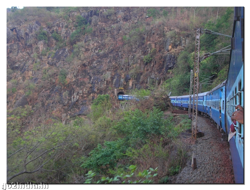 Araku train in month of April from a tunnel