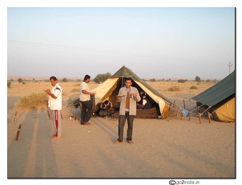 Taking food at a camp inside desert