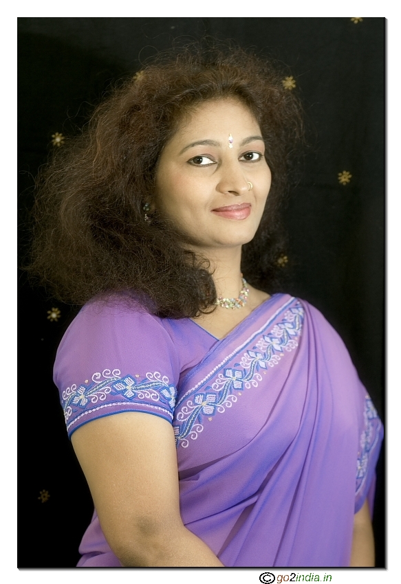 Portrait of a lady wearing Voilet colour saree from Canon 20D with 85 1.8 lens