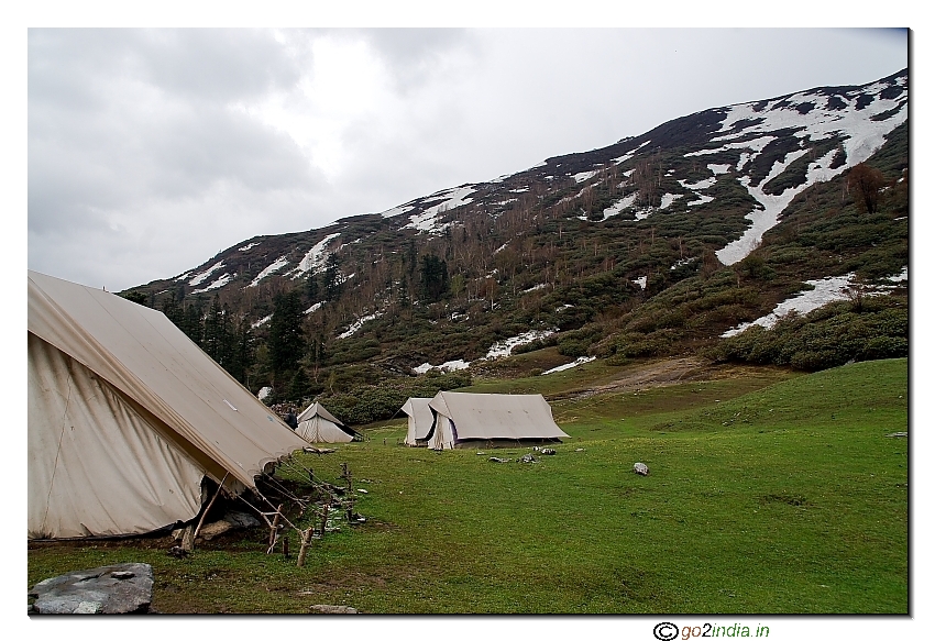 Dhunda Camp site near snow mountains