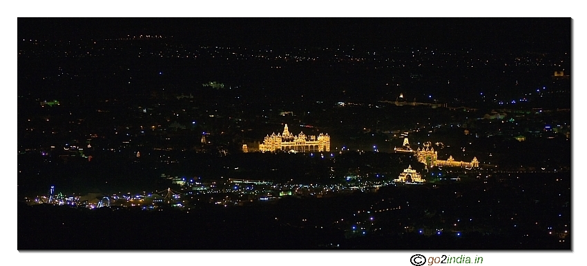 Mysore palace from Chamundi hill during lighting arrangement during Dasara