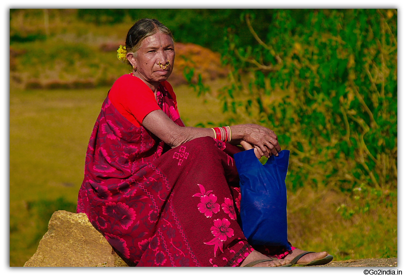 Lady waiting for vehicle near Araku - Paderu