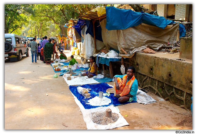 Selling local products at market near Gupteswar temple
