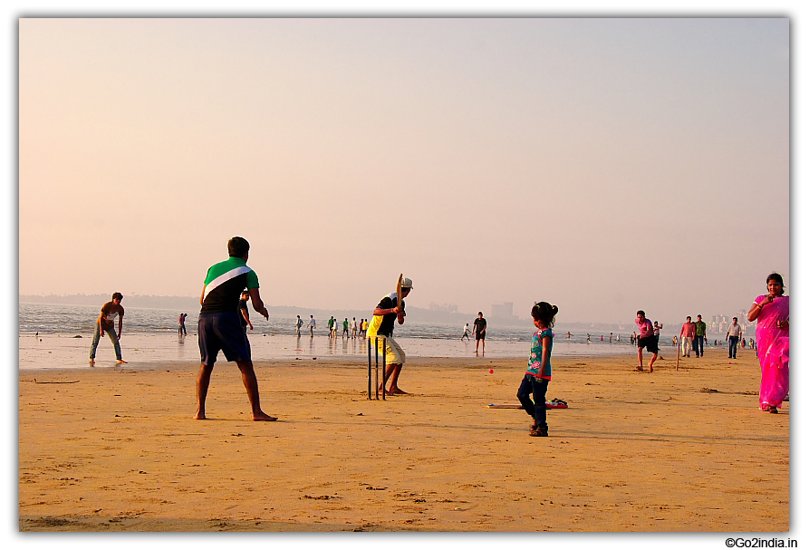 Cricket is popular in Mumbai, Kids playing at Juhu beach 