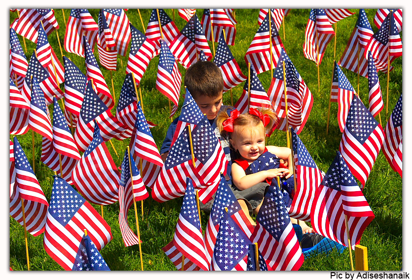Kids inside USA Flag during USA memorial day