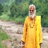 A sadhu near a river in the jungle