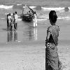 Girl looking at peole playing in sea, Rishi konda beach vizag