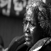 Old tribal lady looking at the crowd shot at Adivasi padaga Orissa