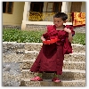 Young Lhama at Naggar Monastery going for lunch