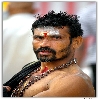 Person wearing Swamy Ayyappa sacred black dress
