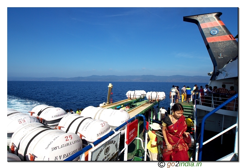 People clilmbing the steps to deck in the ship to Havellock in Andaman