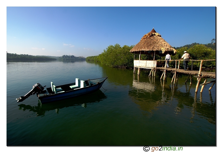 Motor boat waiting for a ride  at Baratang jetty in Andaman