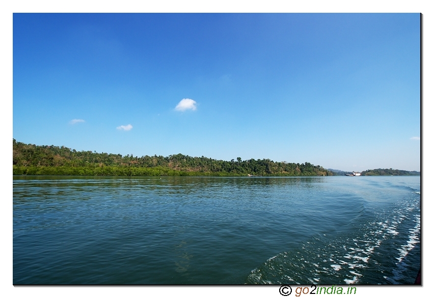 Sea and forest during Boat journey to limestone caves of Andaman at Baratang