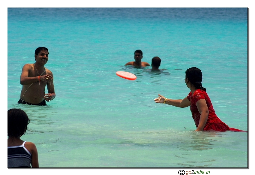 People playing in a sea beach