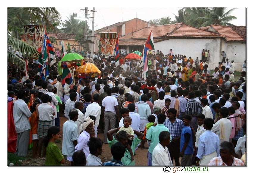 Village people gathering during the procession