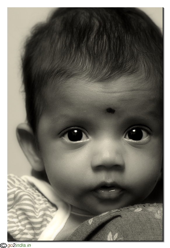 a little kid with surprise