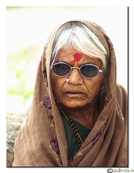 Old woman looking curiously