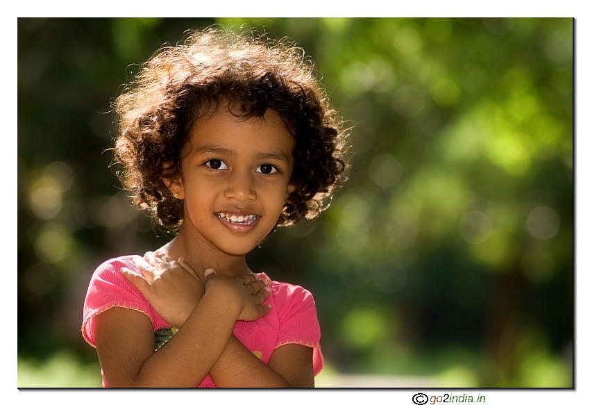 Little girl with folding hands