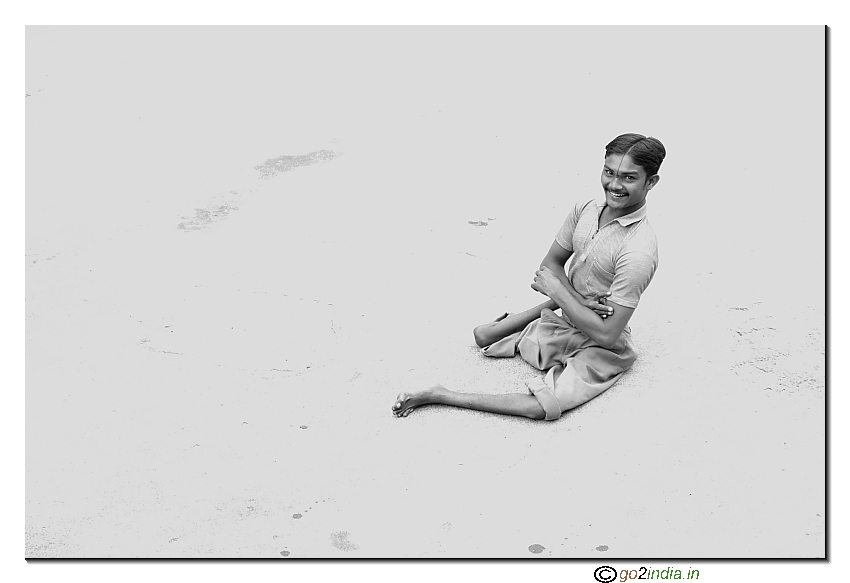 Polio affected boy with a happy smiling face