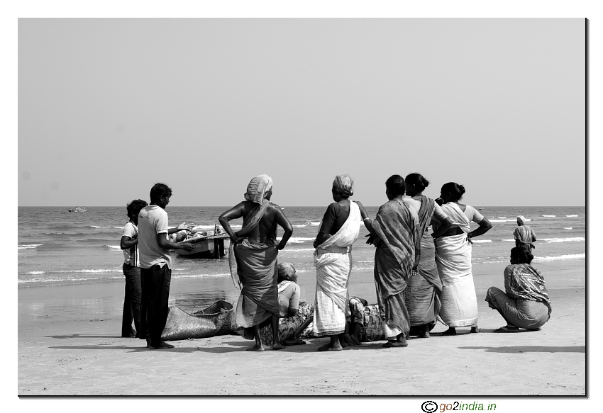 Women gathering near sea at Rishikonda Beach