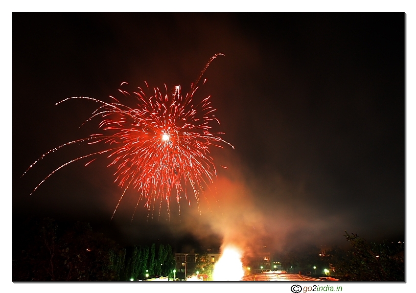 Red fire works in night sky