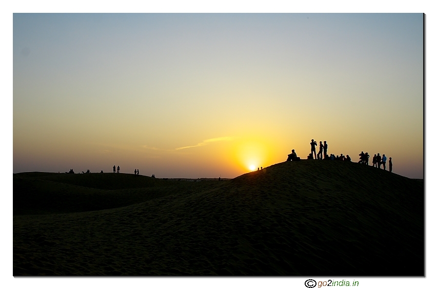 Enjoying sunset on Sand dunes at Jaisalmer 