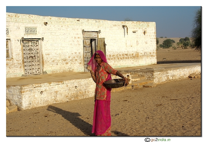 Rural woman inside desert of Jaisalmer