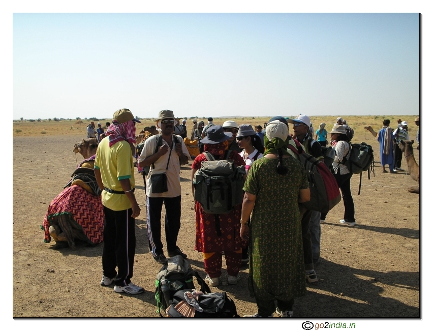 Getting ready for the camel safari in desert