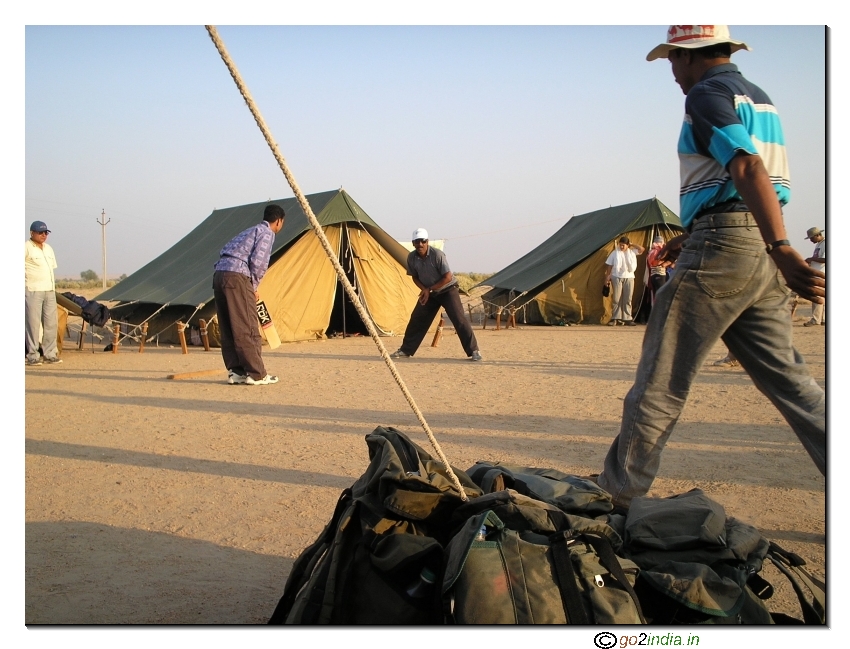 Playing cricket at the camp during desert trekking