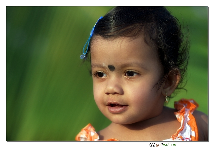 Kid portrait Orange colour dress from Canon 20D with 85/1.8 lens