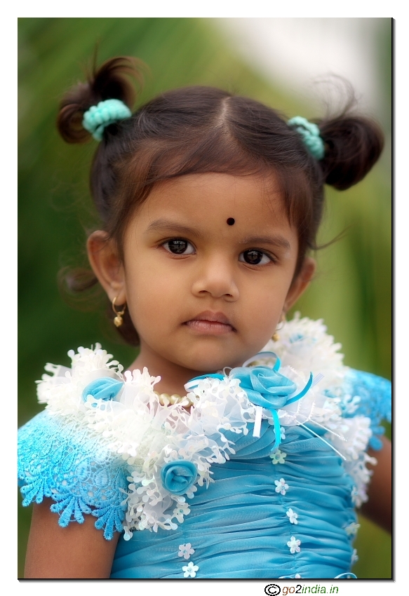 girl kid vertical portrait blue dress evening soft light