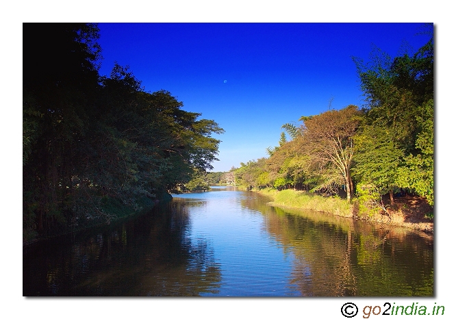 Karanji kere lake crossing the bridge to butterfly park