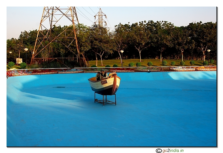 Inside NTR Park a fishing pond with boat