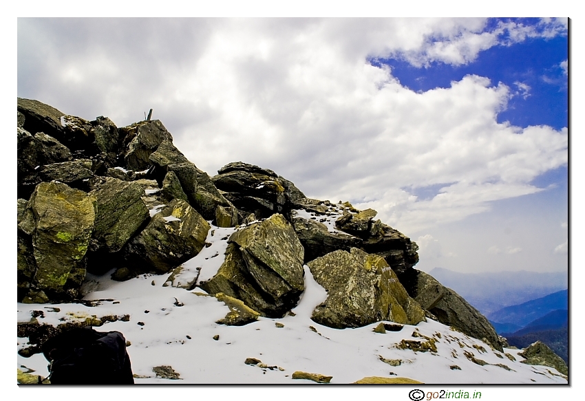 Snow and stone during trekking at Kedarkantha