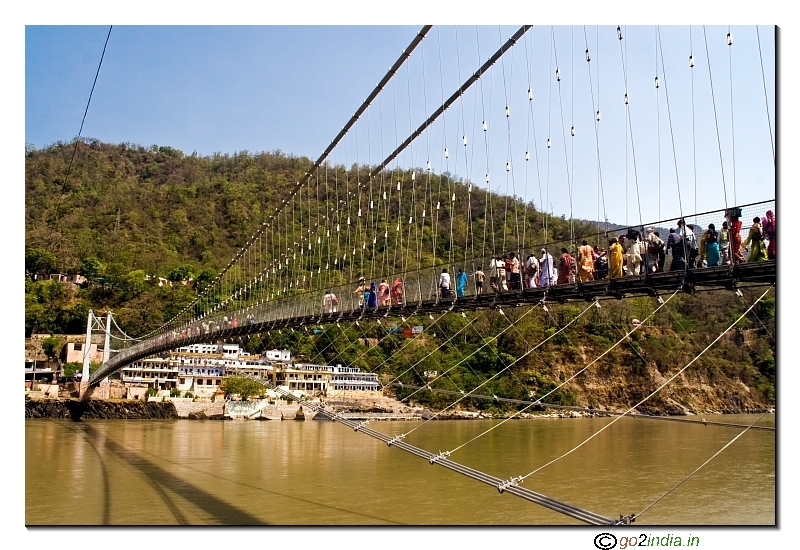 Rama Jhula the suspension bridge over river The Ganga at Rishikesh