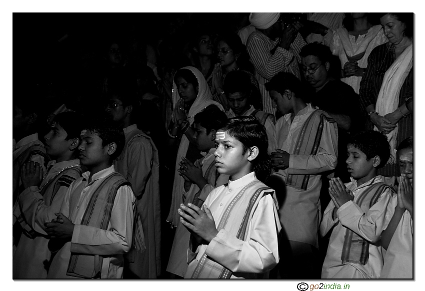 Boy Praying river Ganga at Rishikesh