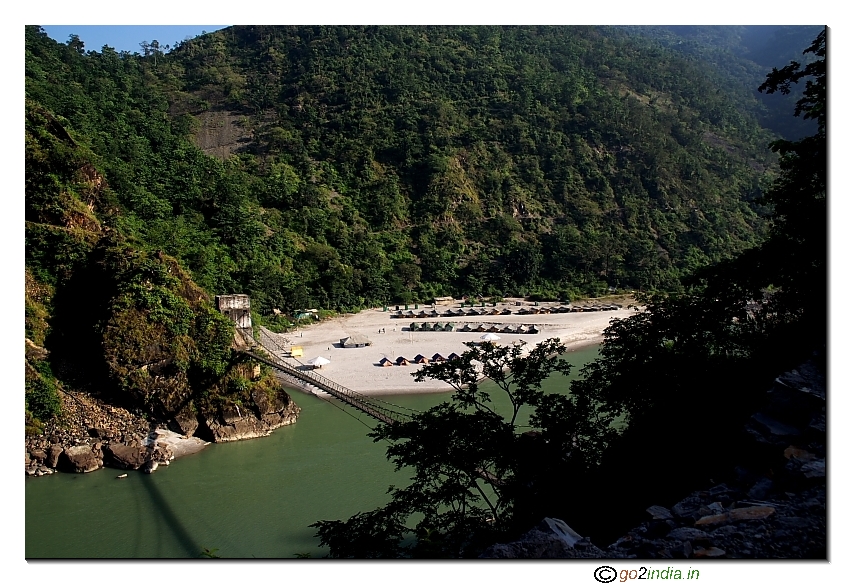 Camp and bridge by the side of river Ganga at Rishikesh