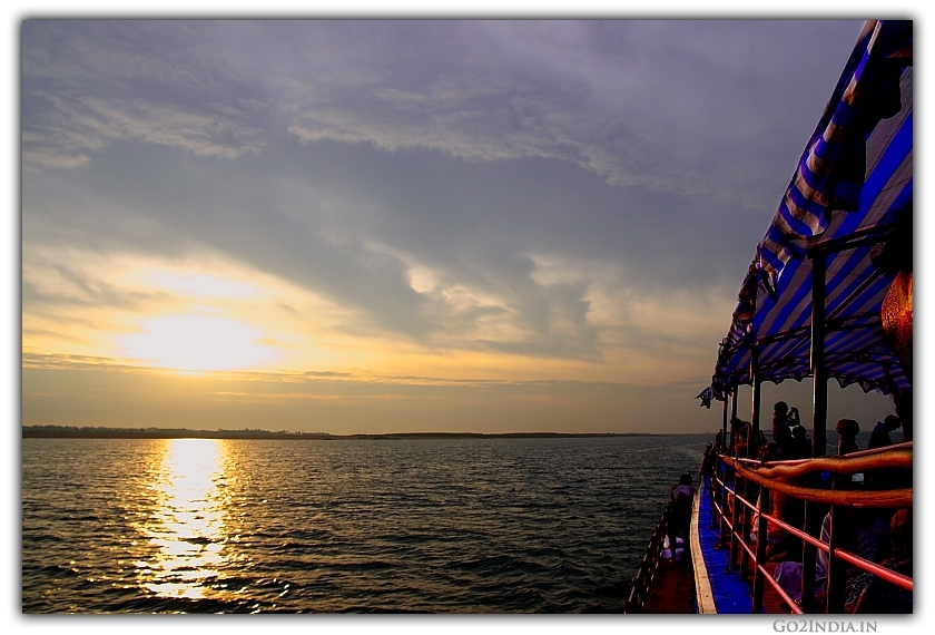 Travellers enjoying Sun rise at Godavari river cruise