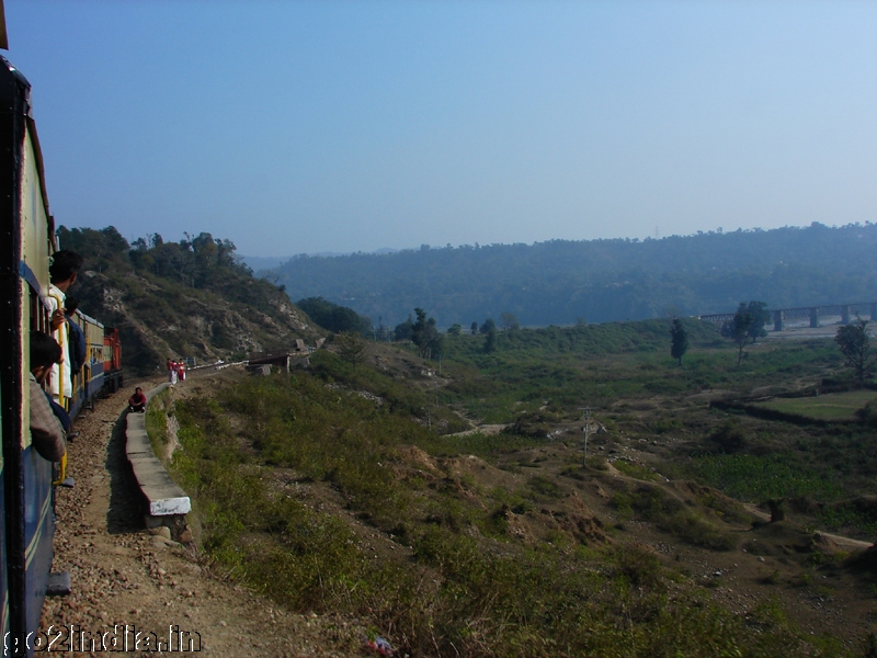 Bridge train and river