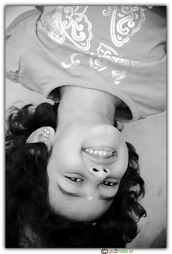 Kid portrait with head down