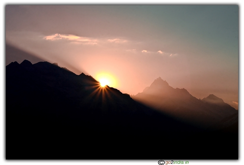 Sun peeping out from Himalaya