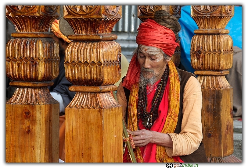 Saint at a temple in Manali deep thought
