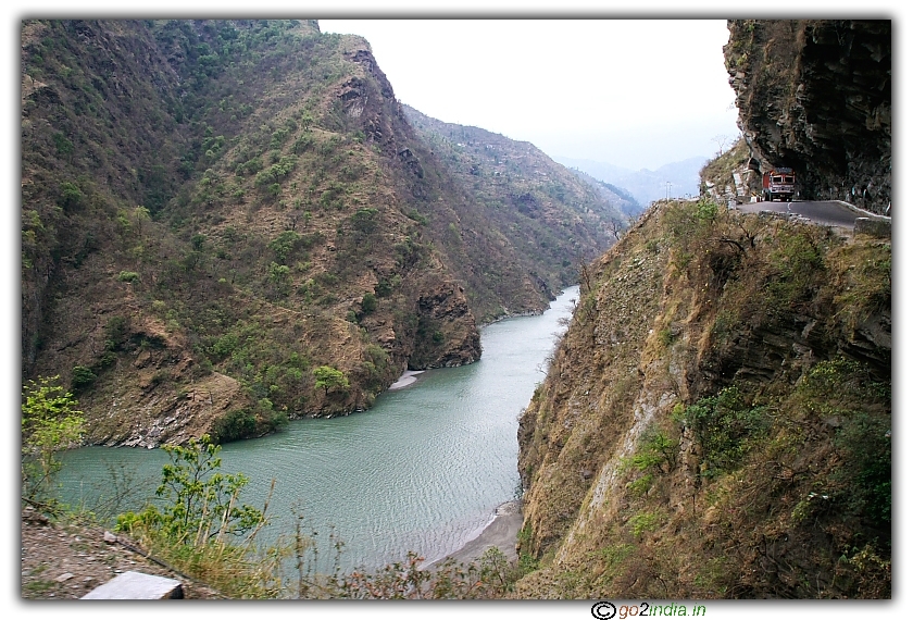 Truck on a road with steep valley towards Manali from New Delhi