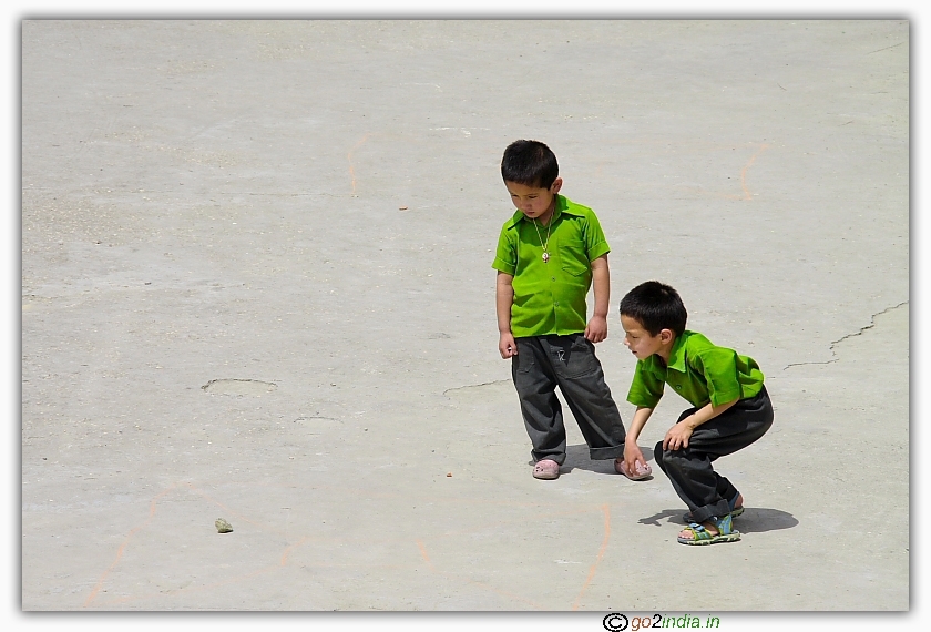 Young lamhas playing in a monastery
