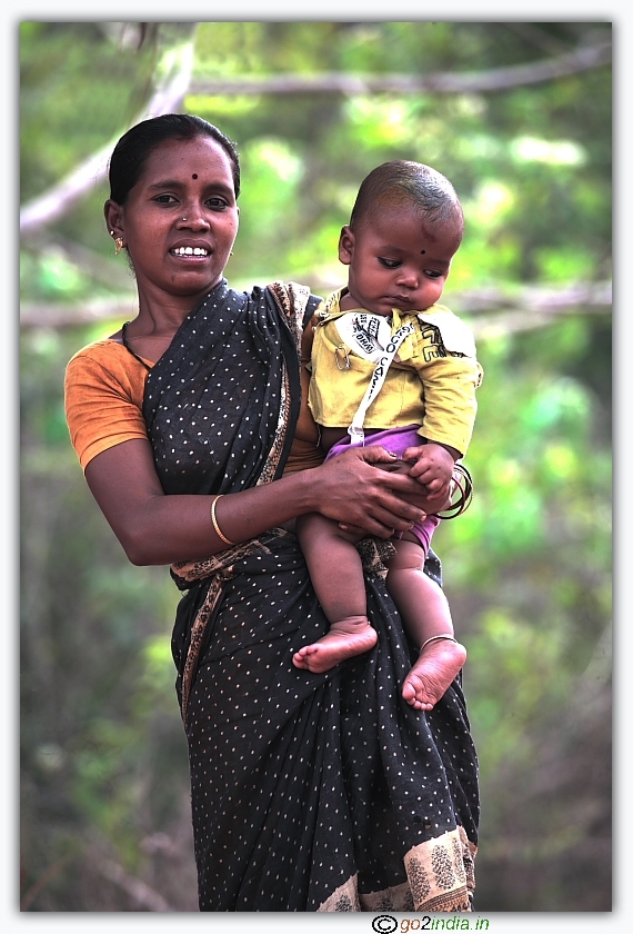 village woman with kid