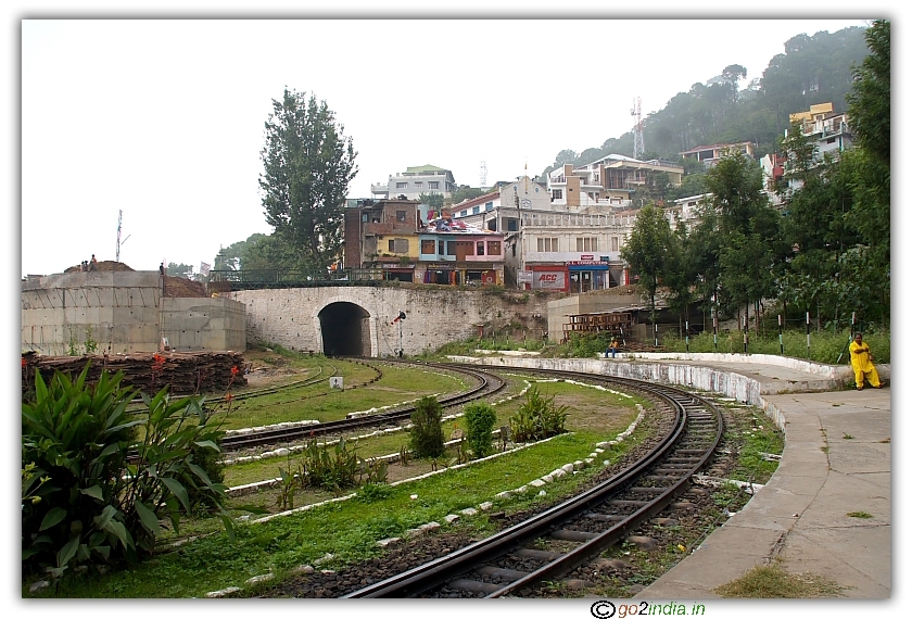 Tunnel ahead on toy train track on the way to Shimla