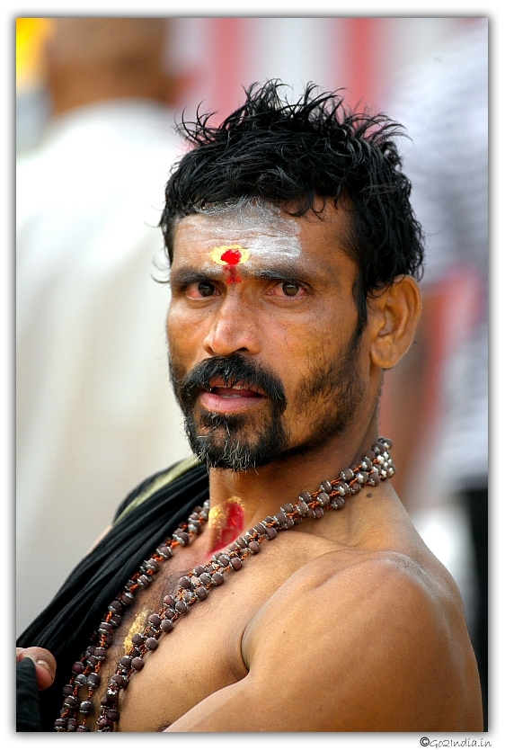 Person wearing Swamy Ayyappa sacred black dress