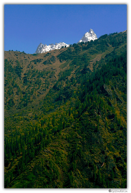 The sacred Om peak on top of Himalayan valley