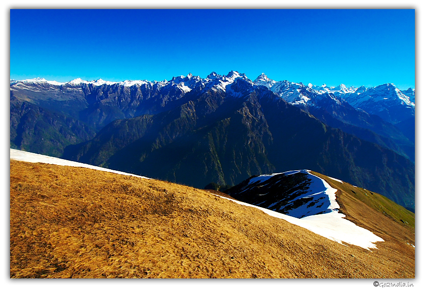 Varied colors in the valley with snow before Sarpass