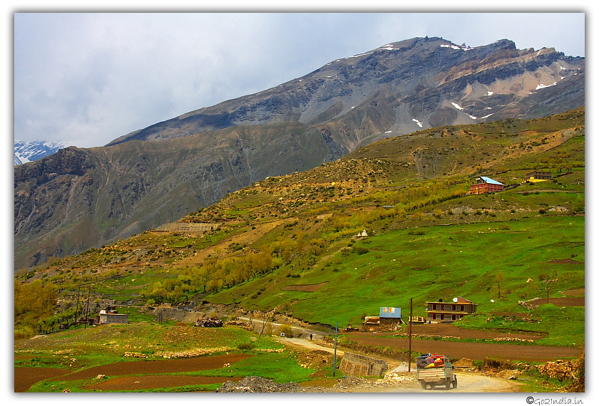 Roadway beside Himalayan hill range